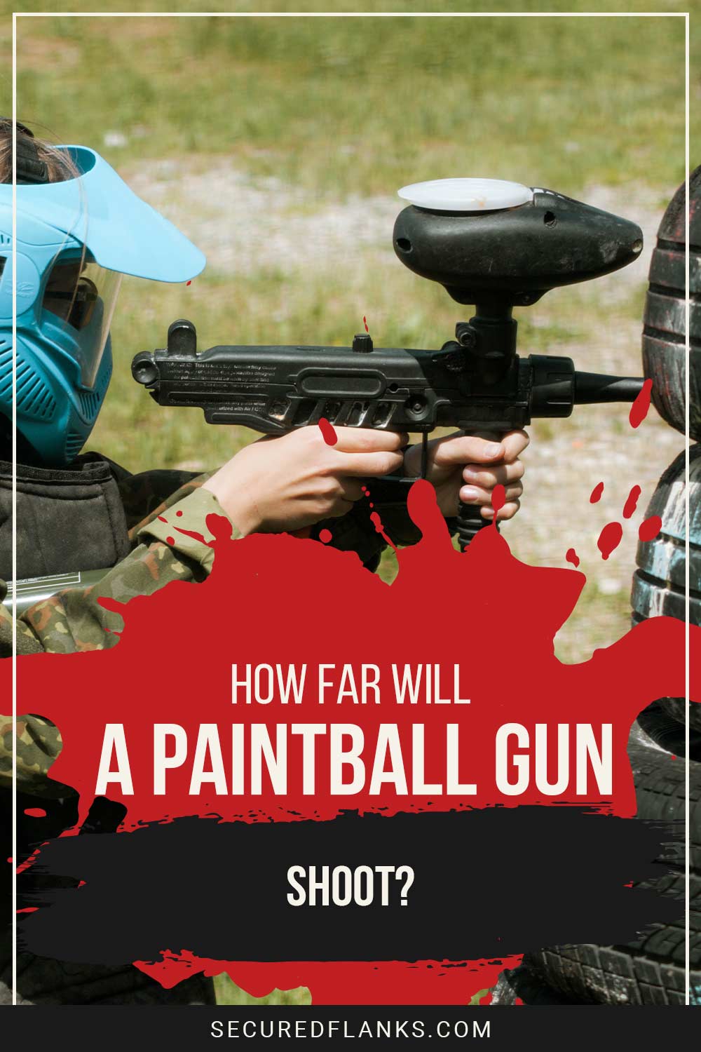 Woman wearing a blue helmet shooting with a paintball gun - How Far Will A Paintball Gun Shoot?