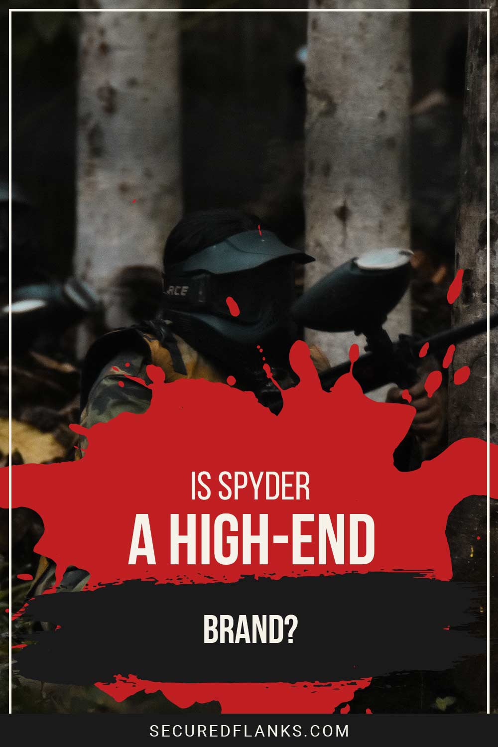 Person wearing a black paintball helmet with a paintball gun in hand in the woods - Is Spyder a High-End Brand?