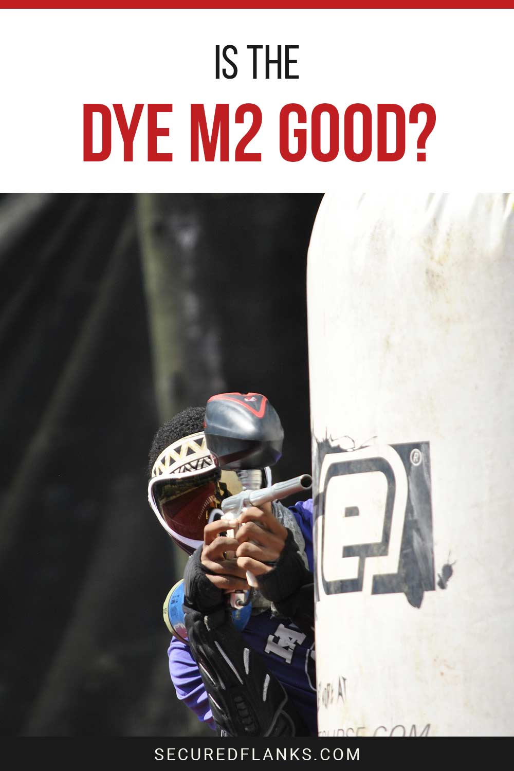 Person peaking with paintball gun in hand - Is the Dye M2 Good?