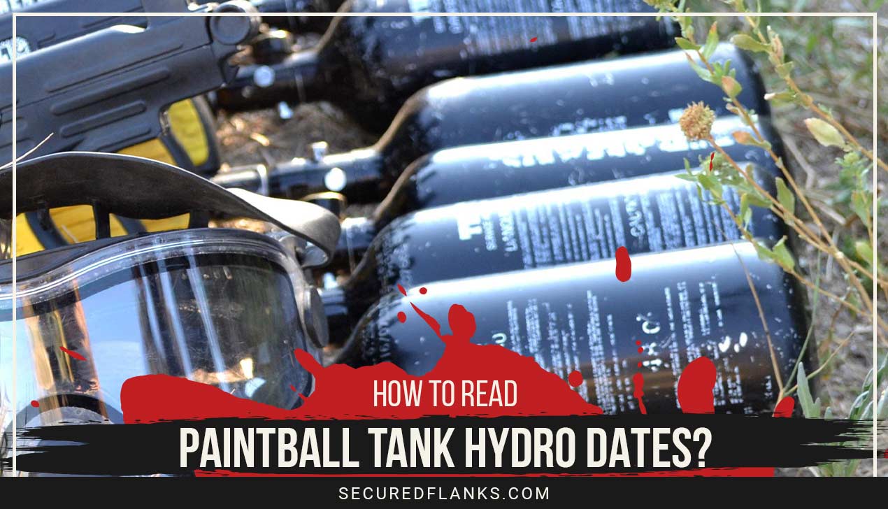 Few paintball tanks on ground - How To Read Paintball Tank Hydro Dates?