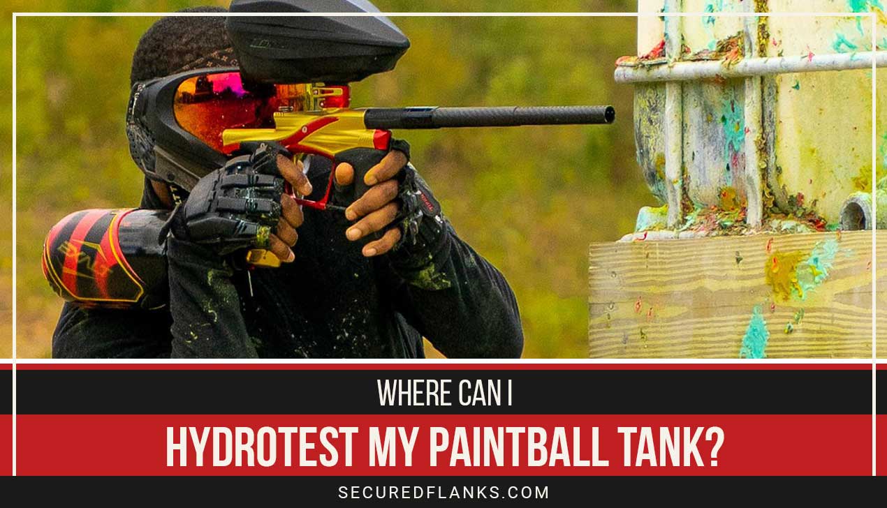 Person aiming with a small paintball gun - Where Can I Hydrotest My Paintball Tank?