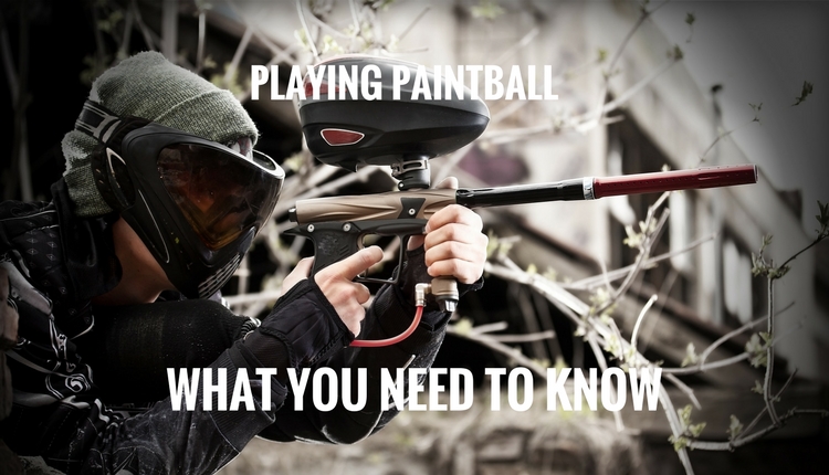 Guy Showing How to Play Paintball