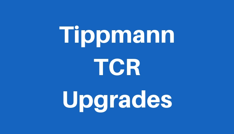 Tippmann TCR Upgrades Written in White Text on a Blue Background